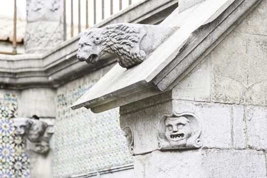 Gargoyle in Sintra Pena Palace, detail of an old heritage of humanity building, tourism in Portugal