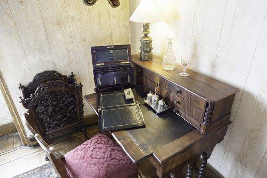 Old wooden desk, detail of an old place to write, wood art