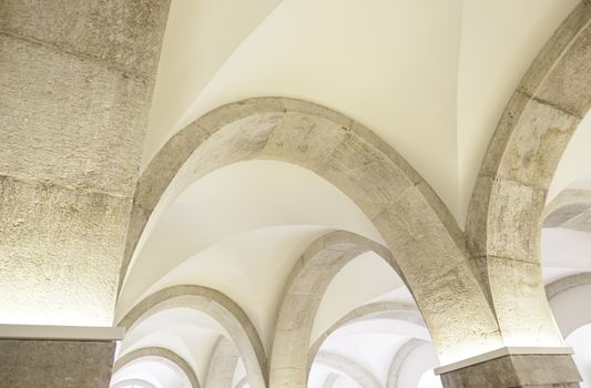 Arches in an old church, detail of the interior of an ancient monument