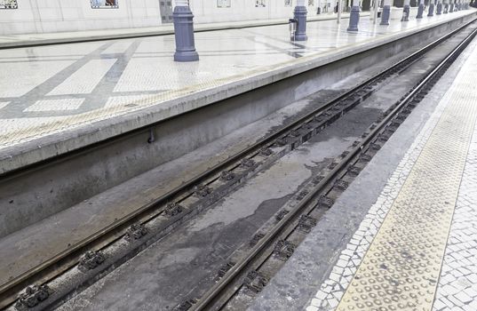 Railroad tracks at a station, detail of a train station, public transport