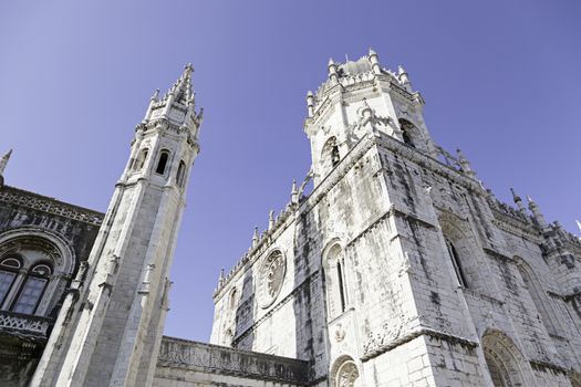 Facade of Jeronimos in Lisbon, detail of old building in Portugal, Manueline architecture