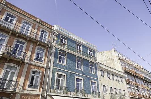 Typical facade tiles in Lisbon, facade detail of an ancient decorated