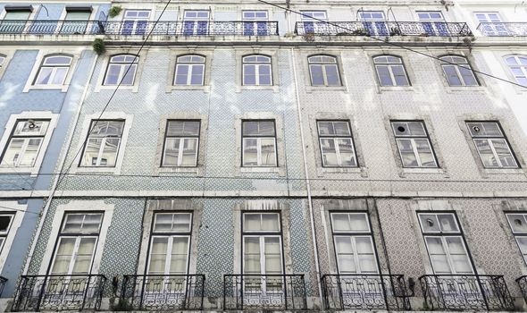 Typical facade tiles in Lisbon, facade detail of an ancient decorated
