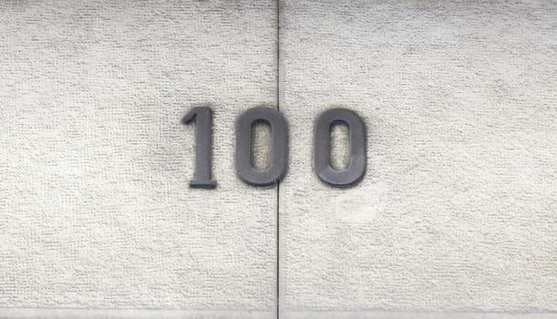 Number hundred in a house, a number of detailed information on the facade of a house