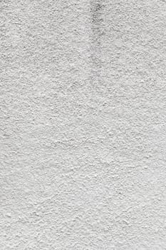 Cement wall rough, detail of a facade embossed textured background, construction