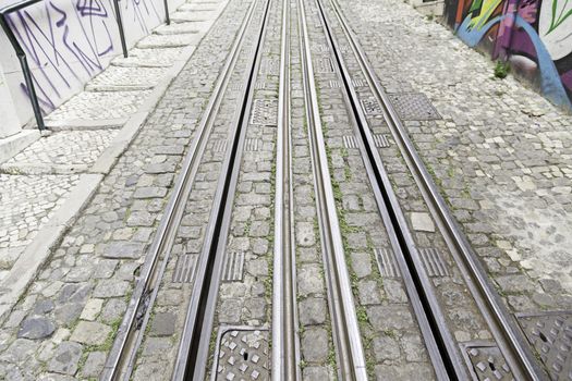 Tram tracks in the city, a detail of public transport in the city of Lisbon, former public transport