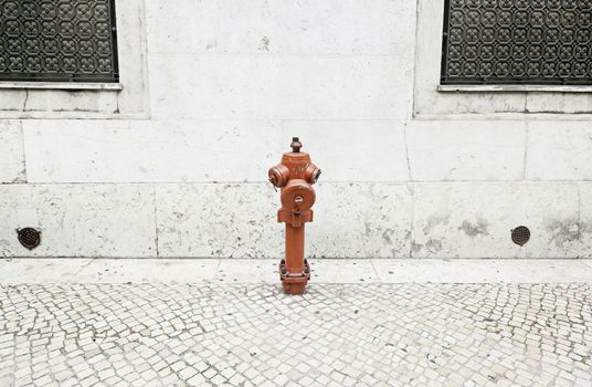 Fire hydrant in a city, detail of an item to put out fires, real protection and safety