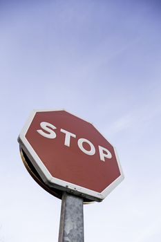 Stop sign outdoors, detail of an information signal in a highway traffic signal