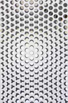 Perforated metal railing, detail of a metal wall protection, safety and toughness