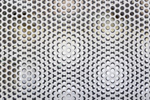Perforated metal railing, detail of a metal wall protection, safety and toughness