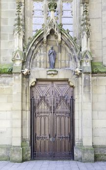 Gothic church door, detail of a religious and historical, art and religion building