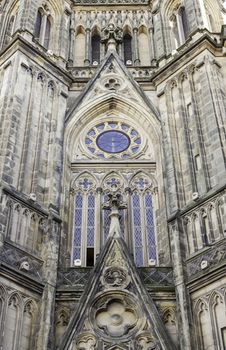 Facade of Gothic church, detail of a historical landmark in the city, art and religion