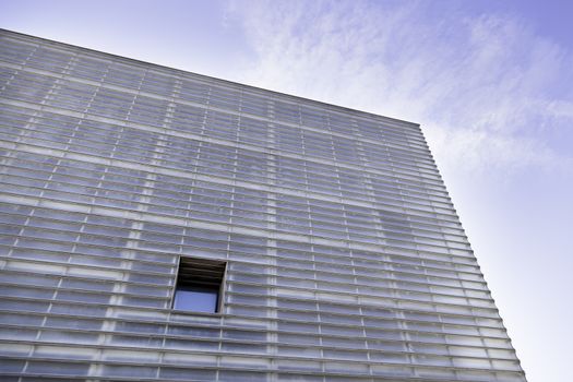 Modern windowed building, detail of a facade in the city, modern architecture