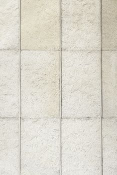 Stone tile wall, detail of a marble wall textured background with highlight