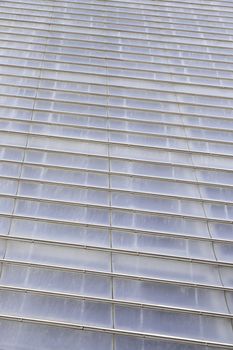 Clear plastic facade, detail of a facade covered in the city, decoration and protection