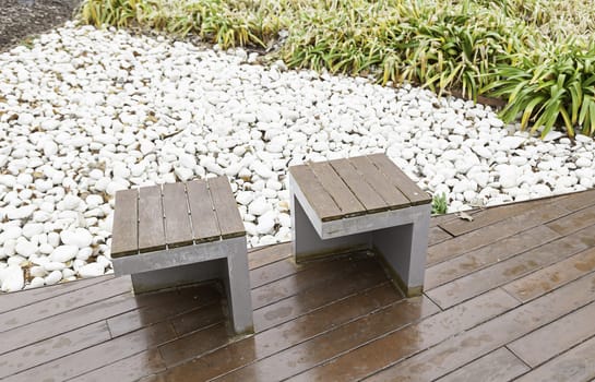 Banks in an oriental garden, detail of benches to rest in a zen garden, oriental decoration