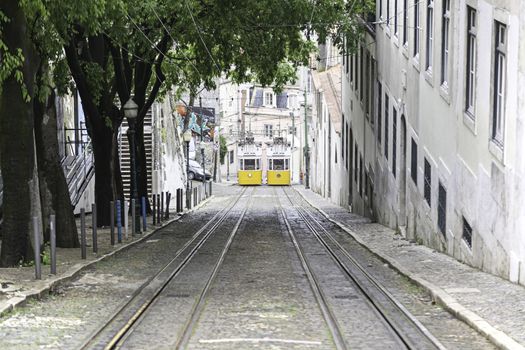 Old trams in Lisbon, detail of an old city transport, ancient art, tourism in the city