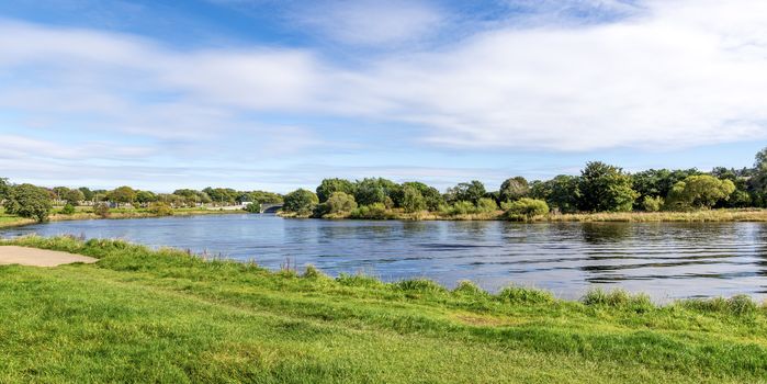 A scenic beautiful panoramic view of river Dee in a nice sunny day in Aberdeen, Scotland