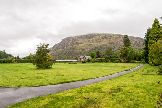 A greenhouse at the foot of the mountain in Benmore Botanic Garden, Loch Lomond and the Trossachs National Park, Scotland