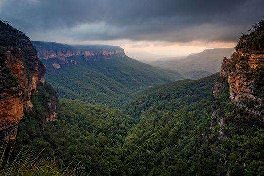 Sunset and storm clouds over Valley of the Waters Blue Mountains Australia