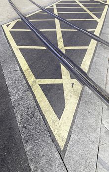 Routes of tram in the city, detail of an urban transport circulation signal, asphalt and city transport