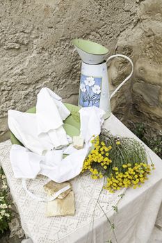 Pitcher and handmade soap, detail of a typical village scene in Spain, handmade products