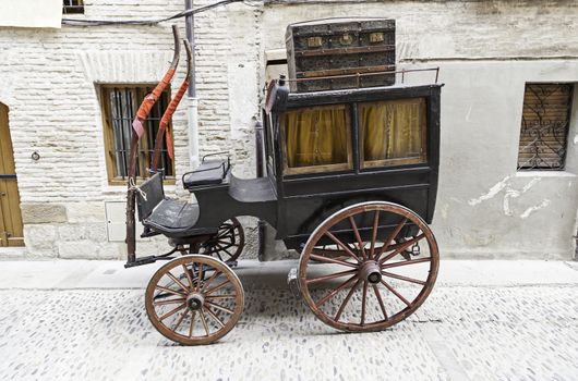 Old wooden chariot, detail of an old classic transport, animal traction, historical