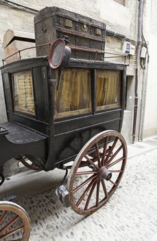 Old wooden chariot, detail of an old classic transport, animal traction, historical