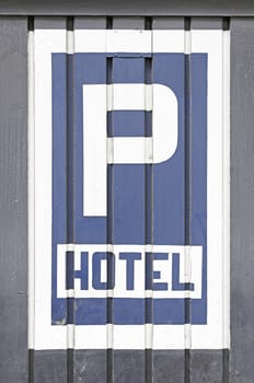 Hotel parking sign, detail of an information signal to the car park