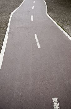 Small road, detail of an asphalt road in the city, transportation