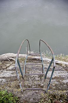 Stairway into the sea, detail of a staircase to reach the sea bottom with water