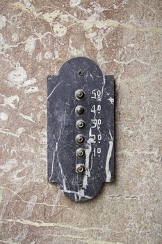 Old Victorian timbre, detail of an old marble bell, exterior