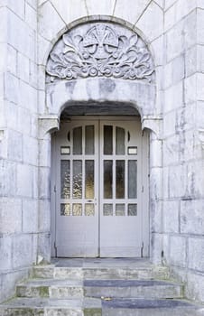 Ancient door in a fortress, detail of an old door in an old building and historic