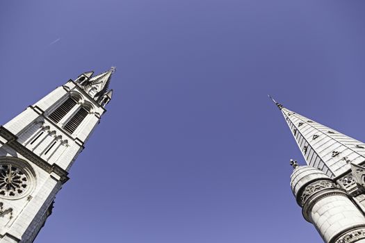 Towers of Lourdes Church, detail of the towers with sky background, historical and religious building