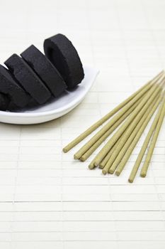 Incense and charcoal, detail in the spa aromatherapy, meditation and deep relaxation eastern