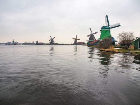 Historic windmills at Zaanse Schans ,neighborhood in the Dutch town of Zaandam, near Amsterdam,  The Netherlands.