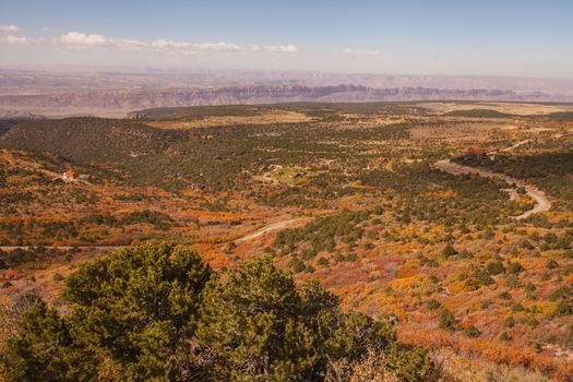 View over Utah from the Manti-La Sal Mountains with Canyonlands National Park visible in the distance.
