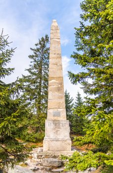 Stone monument of Adalbert Stifter - writer of Sumava Mounains - above Plechy Lake, Sumava National Park, Czech Republic.