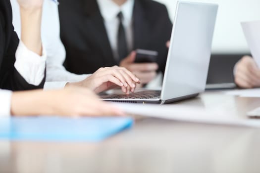 Close-up of Business people working together at meeting