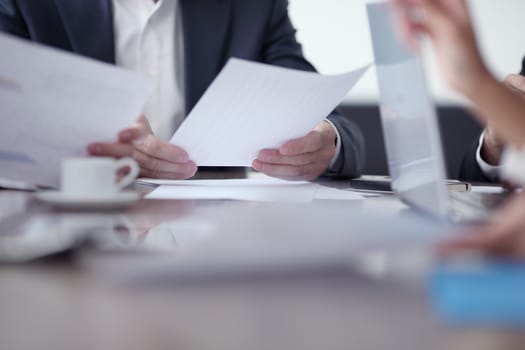 Close-up of Business people working together at meeting