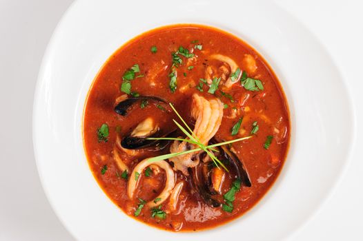 Seafood Soup in white dish, japanese cuisine, top view