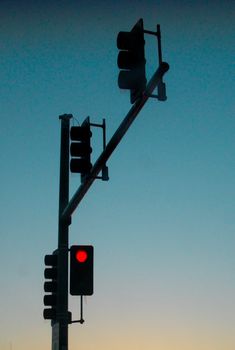 The signal display the red light in San Francisco, America. Green light means Go, and Red one indicate Stop.