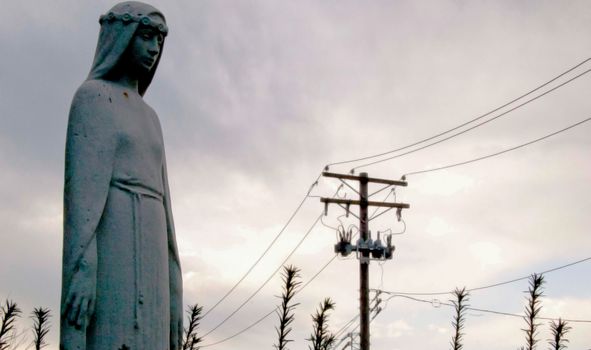 Statue of Maria is on the street of St. Louis, Missouri. St. Louis is a city located in the middle of USA.