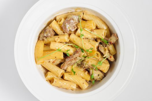 penne pasta with veal meat, top view