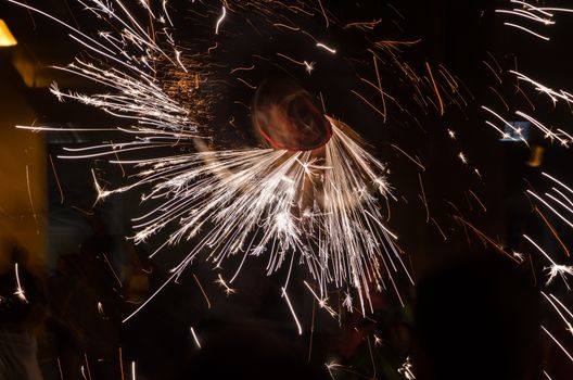 Spiral trace of the sparks of the fire bull fireworks roulette