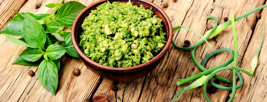 Homemade italian pesto sauce and ingredients.Italian food