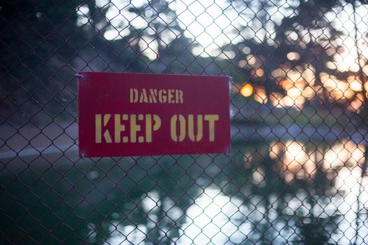 Sing says DANGE KEEP OUT on the park of Long Beach, California. California is known with a good wether located in United States. 