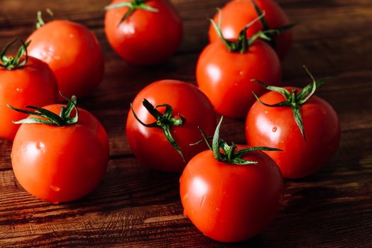 Fresh Ripe Tomatoes on Table. Close Up.