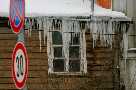 House with icicles in Cesis, Latvia.