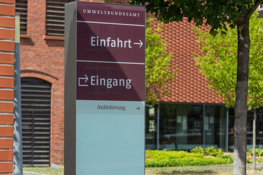 Entrance to the Federal Environmental Agency in Dessau in the foreground a sign with inscription in German - entrance, entrance Federal Environment Agency